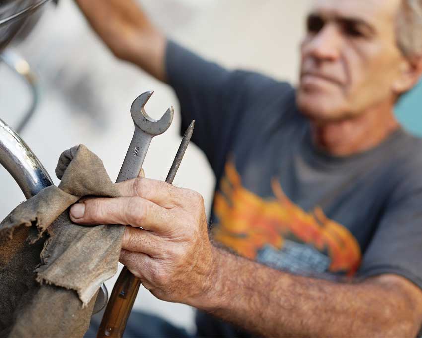 man working on car