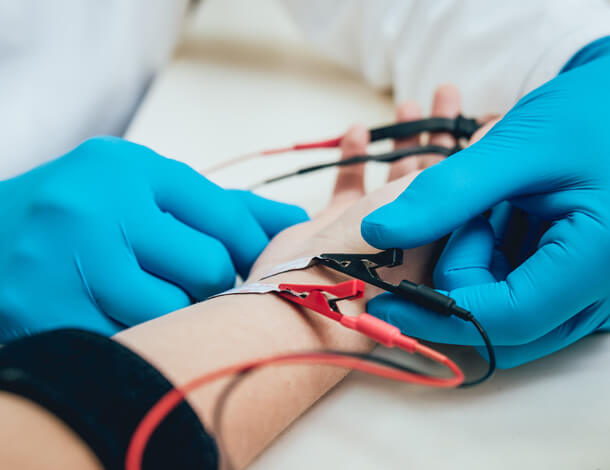 patient getting EMG testing for carpal tunnel