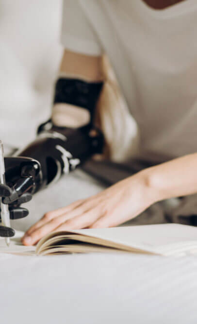 Child using assistive device after limb loss