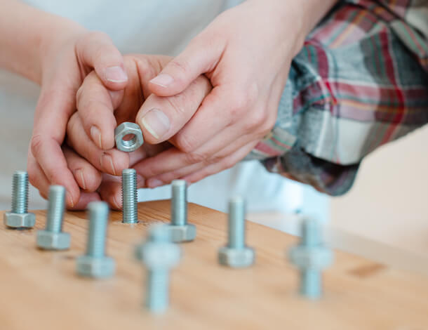 Closeup of a man working with his hand therapist